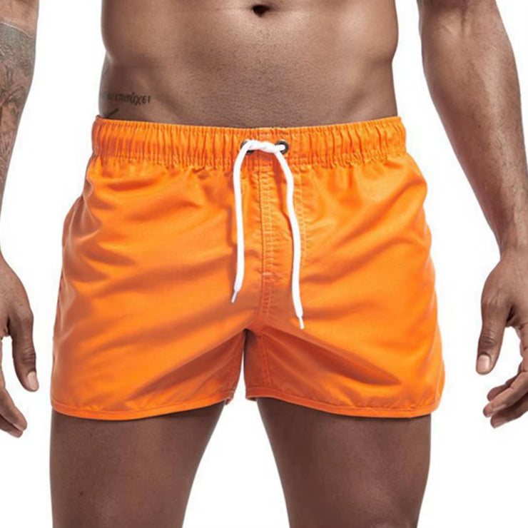Summer Low-Rise Elastic Waistband Drawstring Beach Surfing Shorts Breathable Side Irregular Trim Men Swimwear Shorts