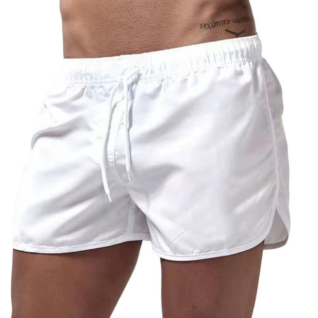 Summer Low-Rise Elastic Waistband Drawstring Beach Surfing Shorts Breathable Side Irregular Trim Men Swimwear Shorts