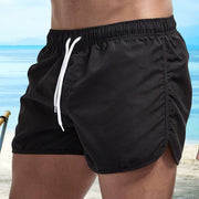 Summer Low-Rise Elastic Waistband Drawstring Beach Surfing Shorts Breathable Side Irregular Trim Men Swimwear Shorts
